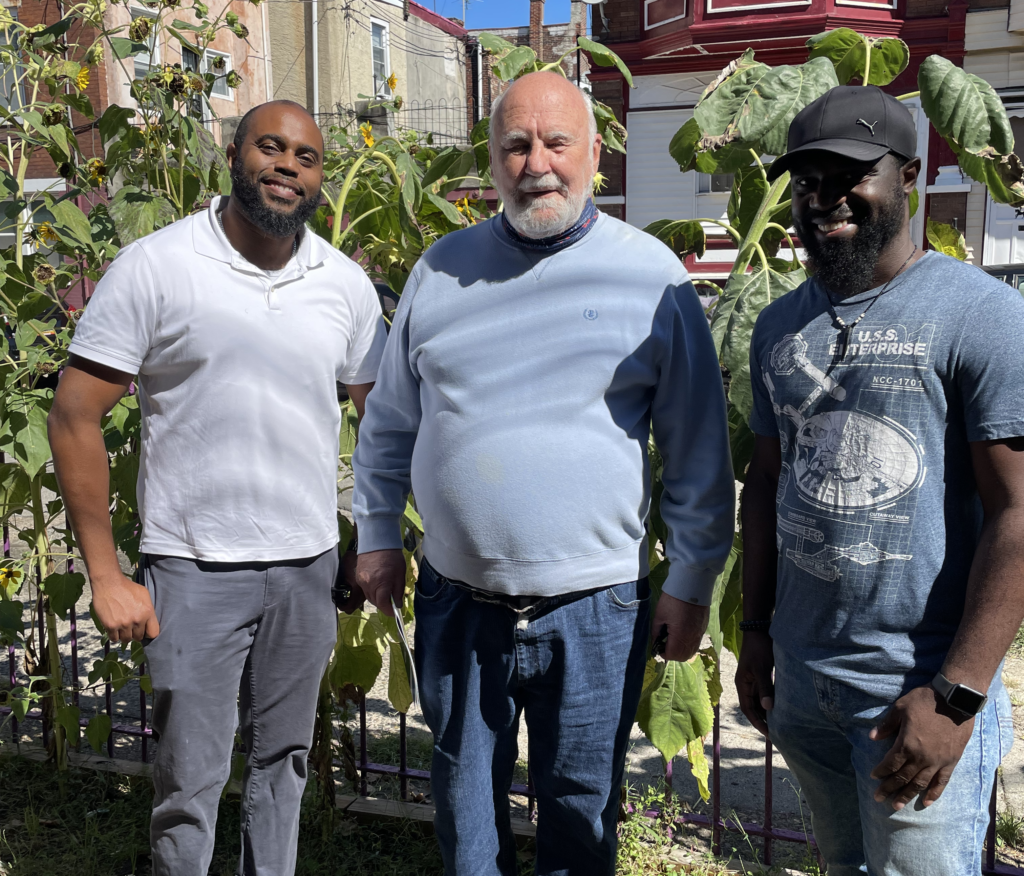 Pictured (left to right) Rev. Christopher Holland, Dr. Donald Dahm, Gene Burke